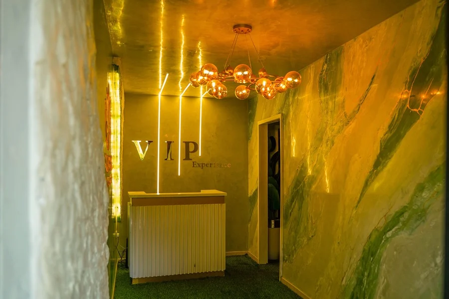 The VIP Experience reception desk in golden light