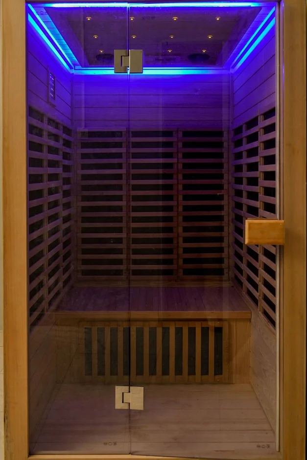 Infrared sauna with blue lighting